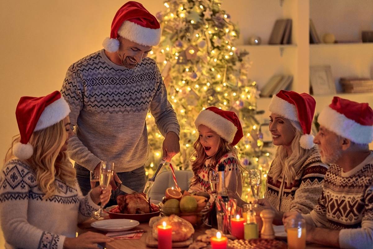 Family celebrates Christmas Eve Dinner