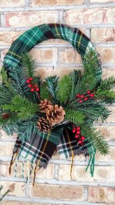 Colorful scarf wreath with pine cones and green