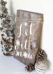 Handmade rustic wooden sign let it snow