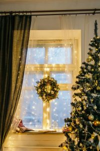 curtain lighting as Christmas window decoration